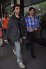 Karan Johar and  Manish Malhotra snapped at Airport in Mumbai on 11th March 2012-1 (14).JPG